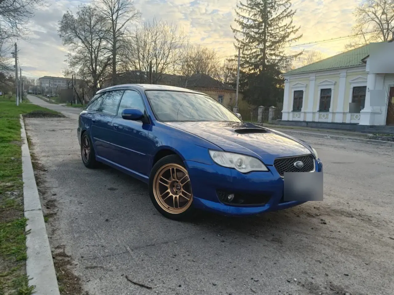Subaru after: the same car with Enkei RPF1 wheels, rendered by TryRims